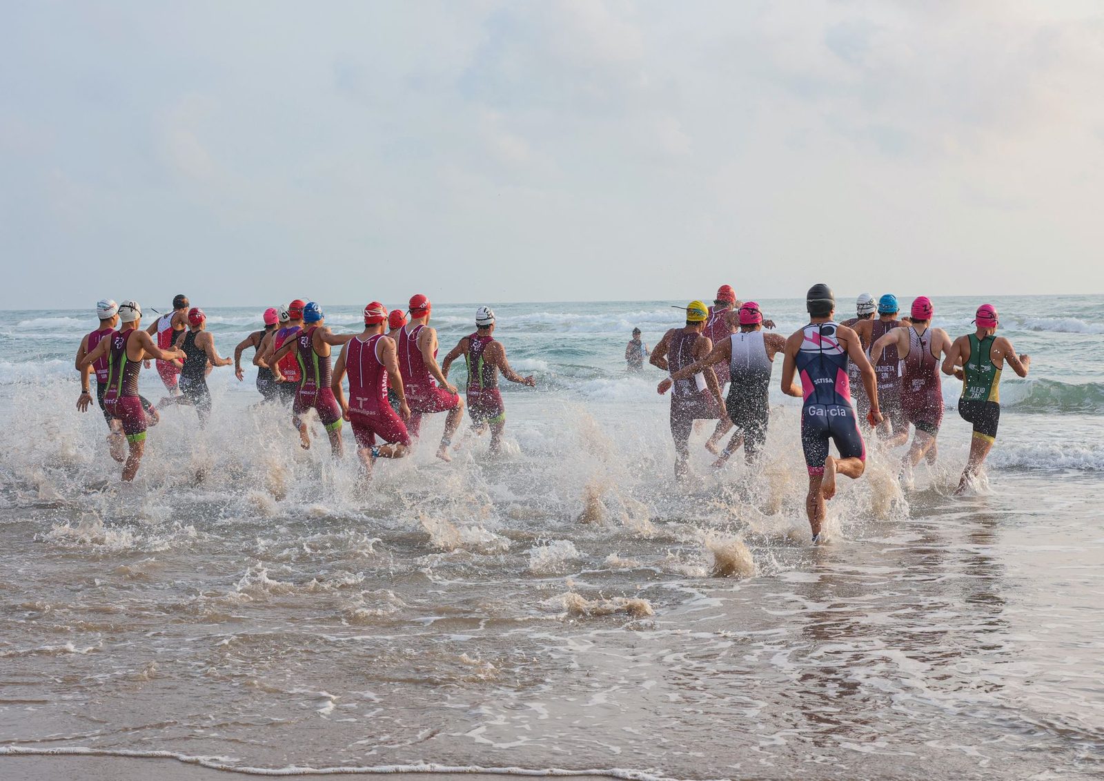 Group swim start during a triathlon race