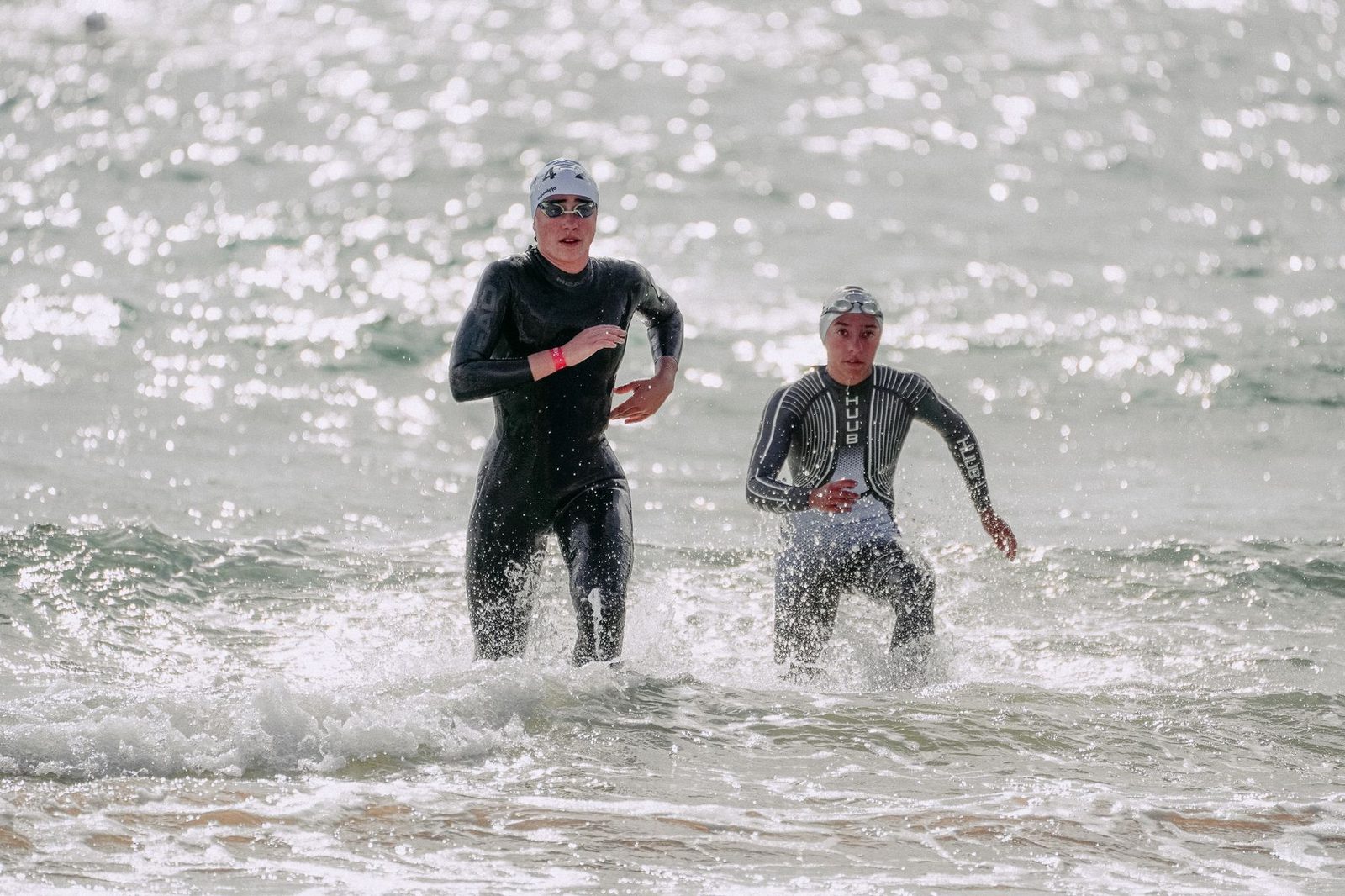 Coming out of the water after the swim leg